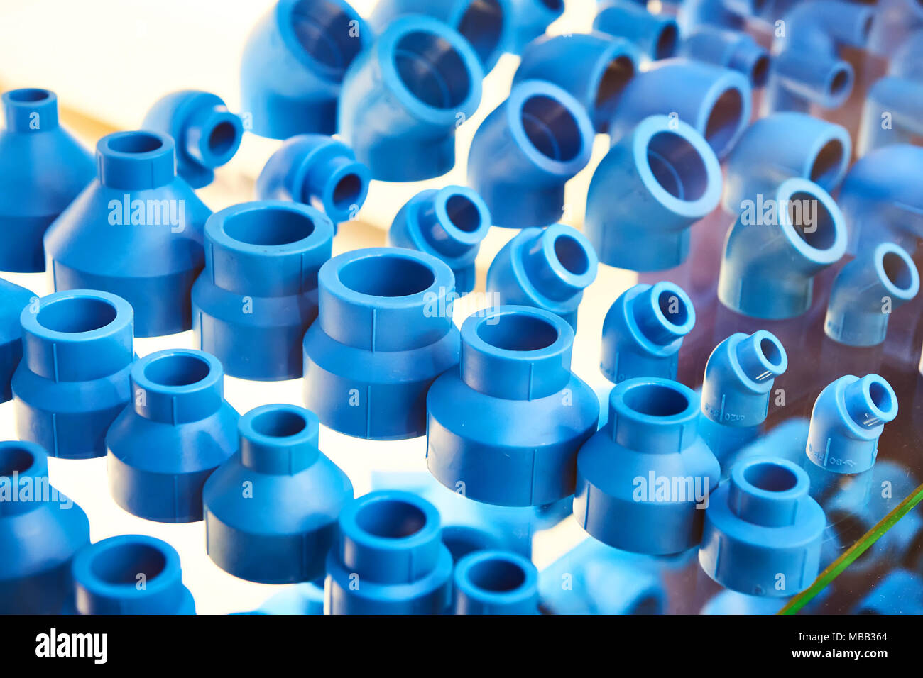 Blue plastic fittings for the plumbing system Stock Photo Alamy