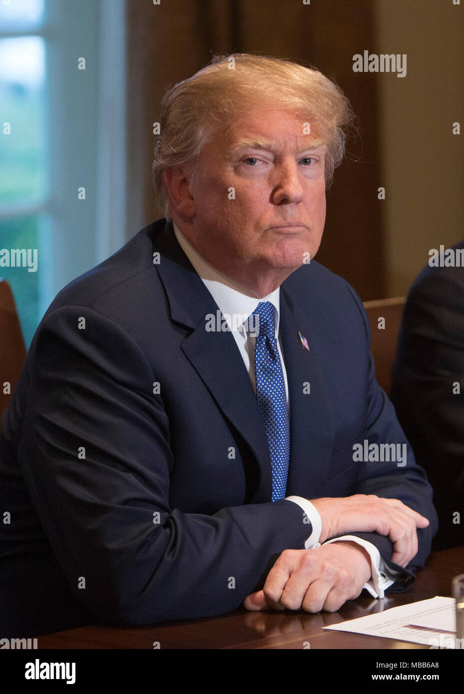 Washington, USA. 9th Apr, 2018. United States President Donald J. Trump makes statements on the ongoing investigation of election meddling and on the current situation in Syria during a meeting with senior military leadership at The White House in Washington, DC, March 9, 2018. Credit: Chris Kleponis/CNP /MediaPunch Stock Photo