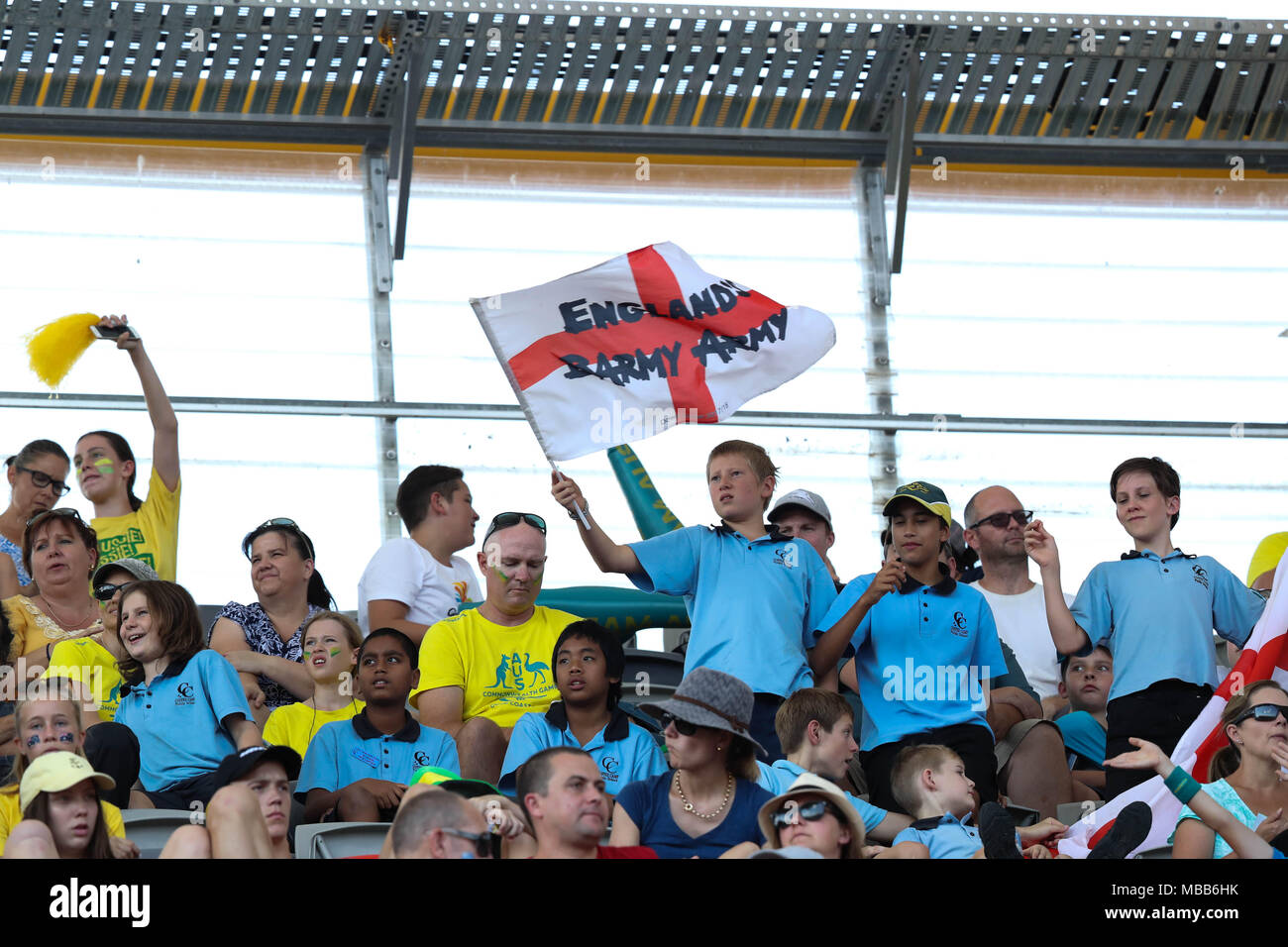 Queensland, Australia. 10th Apr, 2018. A child from Coffee Camp Public School with a Barmy Army 'Down Under 2018' flag at the Athletics on 10.04.18 Credit: Ben Booth/Alamy Live News Stock Photo