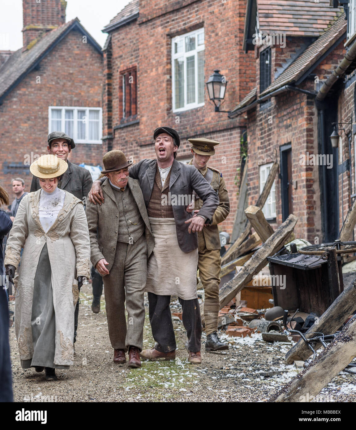 Great Budworth, UK. 9th April, 2018. Actors dressed in Edwardian costumes, starring in the new BBC drama 'War Of The Worlds' by HG Wells, return from filming in the streets of Great Budworth village, Cheshire on Monday afternoon, April 9th. Credit: Ian Hubball/Alamy Live News Stock Photo