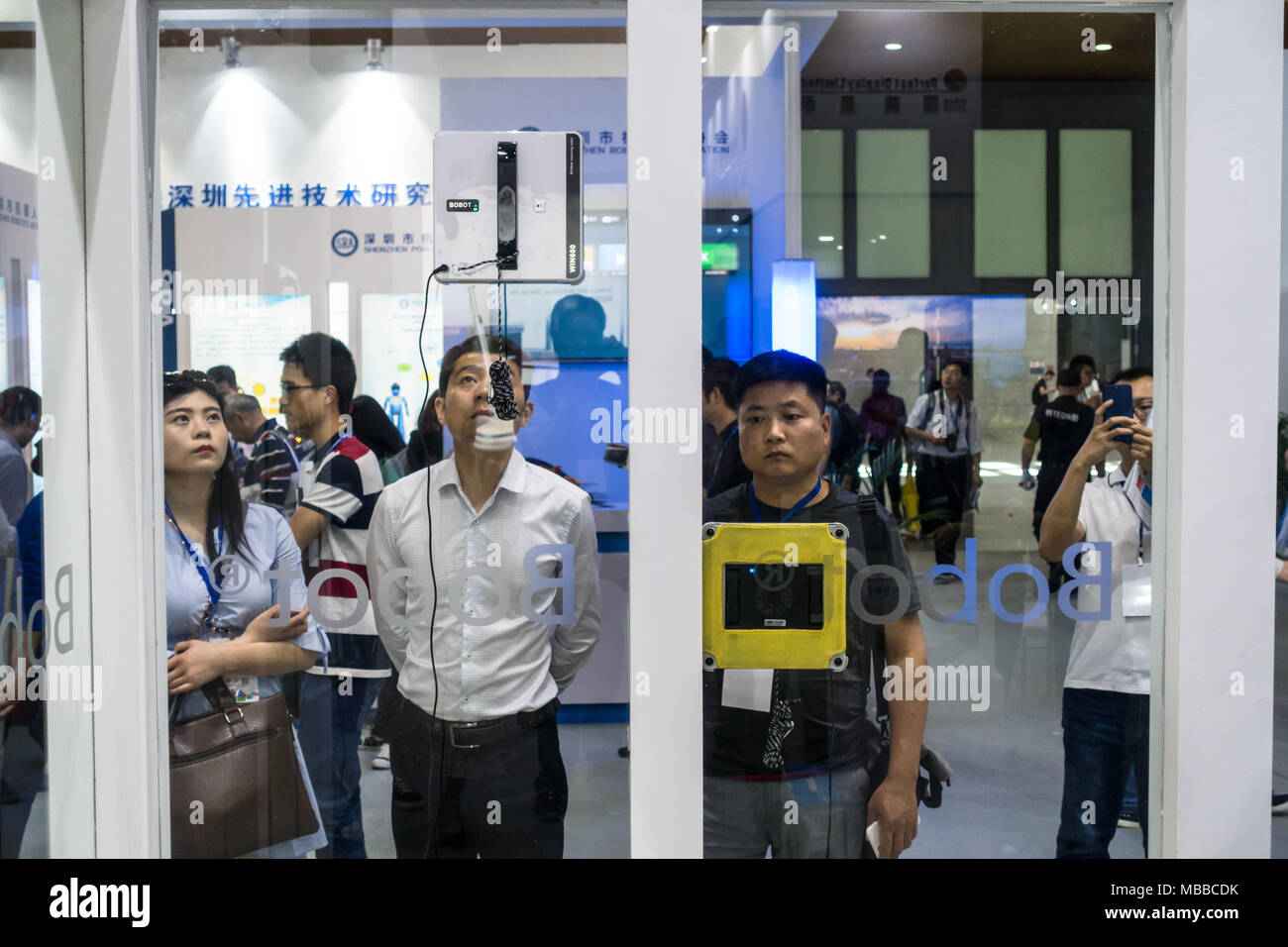 Vacuum (hoover) robot cleaner at technology fair in Shenzhen, China. Stock Photo