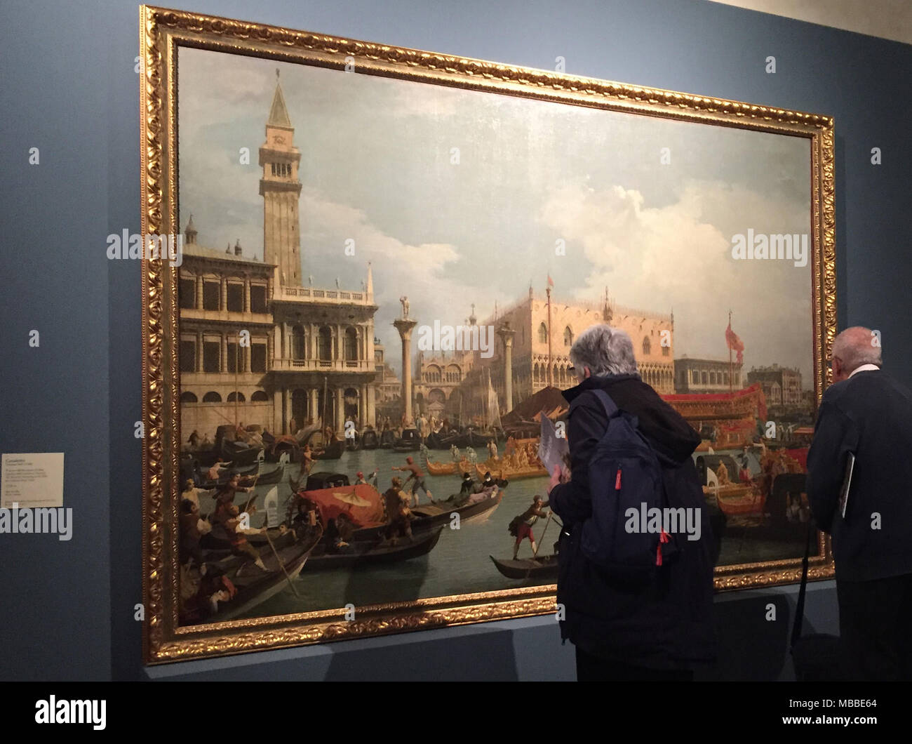 10 April 2018, Italy, Rome: Visitors take a look at the exhibited paintings at the Canaletto exhibition in the Palazoo Braschi. The exhibition opens to the public on 12 April 2018. Photo: Alvise Armellini/dpa Stock Photo