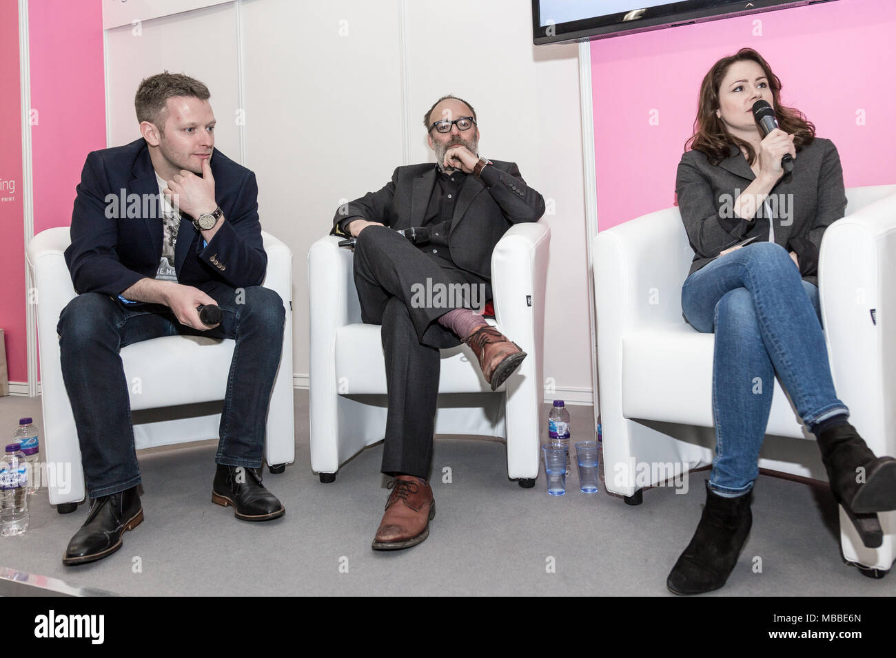 London, UK, April 10, 2018: Authors Joseph Alexander, LJ Ross and  Mark Dawson during the 2018 London Book Fair in Olympia Exhibition Centre in London. Credit: Michal Busko/Alamy Live News Stock Photo