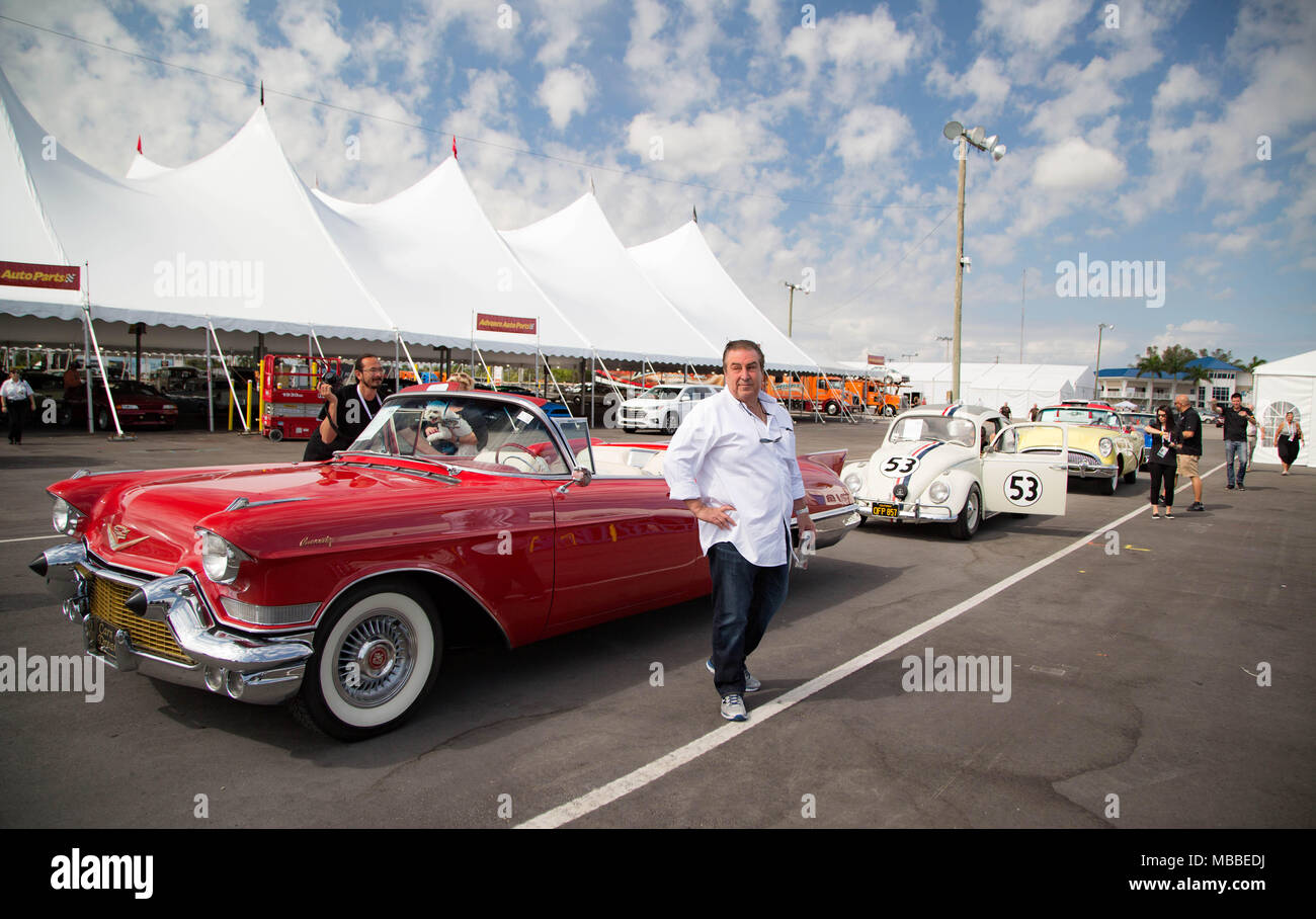 West Palm Beach, Florida, USA. 10th Apr, 2018. John Staluppi arrives at Barrett-Jackson auto auction at the South Florida Fairgrounds in a 1957 Cadillac Eldorado Biarritz convertible in West Palm Beach, Florida on April 10, 2018. Staluppi chaperoned a parade of selected cars from his Cars of Dreams Collection to the auto auction. Staluppi's collection of more than 140 cars will be sold at the 16th annual auction April 12-15. Staluppi plans to add to his current collection. Credit: Allen Eyestone/The Palm Beach Post/ZUMA Wire/Alamy Live News Stock Photo
