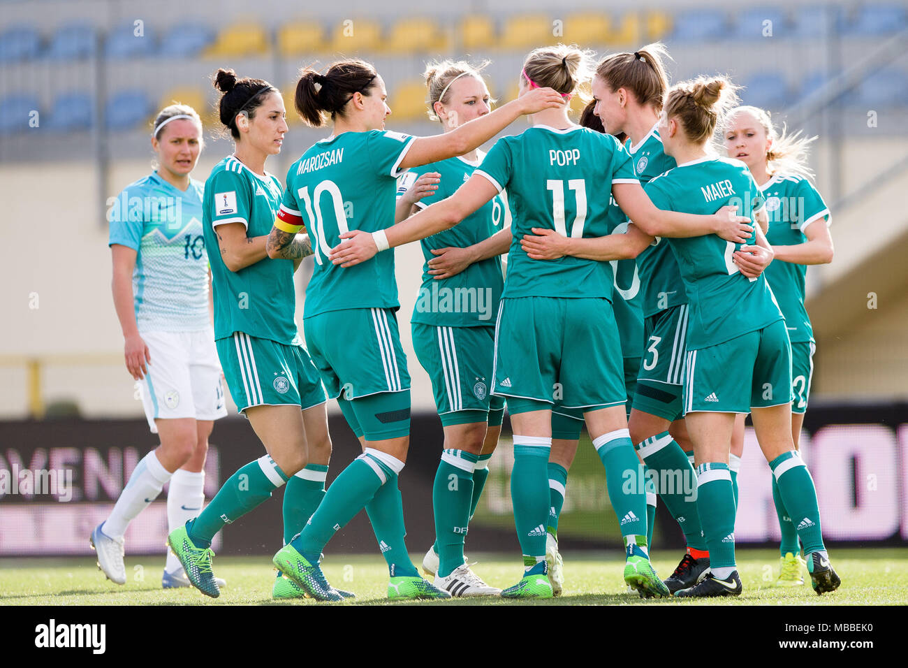 Domzale, Slovenia. 10th Apr, 2018. 10 April 2018, Slovenia, Domzale: Soccer, Women's World Cup qualification, Europe, group stages, Slovenia vs Germany. Germany's players celebrate their side's third goal with goal scorer Alexandra Popp (C). Credit: Sasa Pahic Szabo/dpa/Alamy Live News Stock Photo