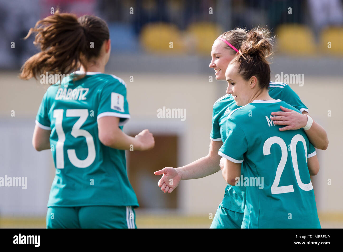 Domzale, Slovenia. 10th Apr, 2018. 10 April 2018, Slovenia, Domzale: Soccer, Women's World Cup qualification, Europe, group stages, Slovenia vs Germany. Germany's Sara Daeritz (L-R), Alexandra Popp and Lina Magull celebrate their side's first goal scored by Magull. (repetition with added text) Credit: Sasa Pahic Szabo/dpa/Alamy Live News Stock Photo