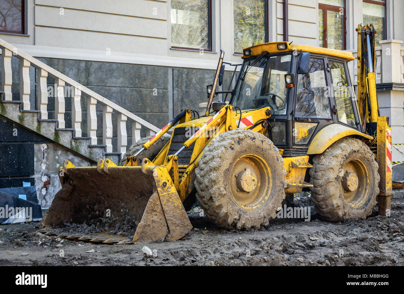 Yellow tractor on the construction site Stock Photo Alamy