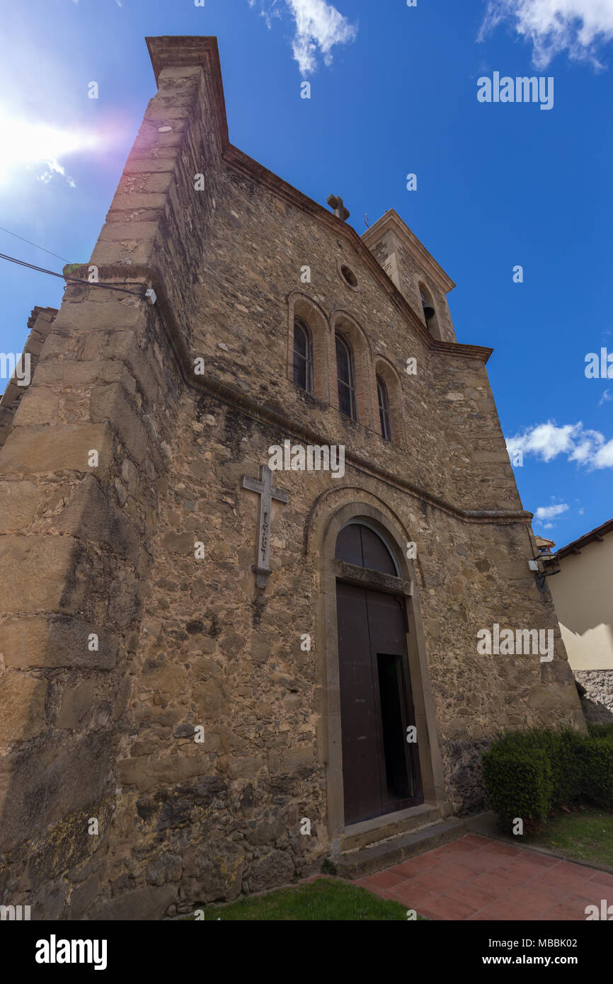 Beautiful ancient church in a small Spanish village Hostales den Bas, in Catalonia in Spain Stock Photo