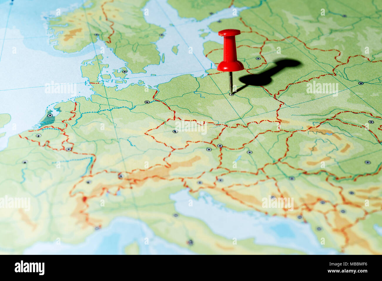 Red pin on a map pointing Warsaw Stock Photo