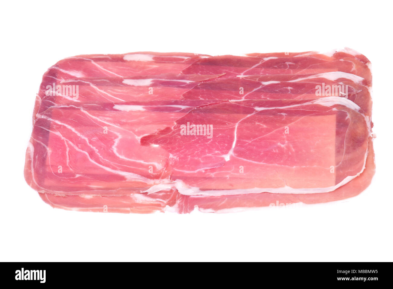 Boneless sliced italian drycured ham prosciutto isolated on white