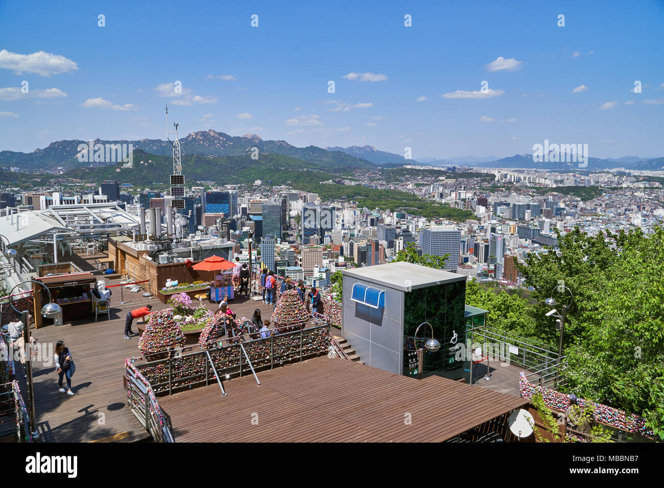 Seoul, Korea - April 26, 2017:  Obervatory in Namsan mountain and cityscape of Seoul. Namsan located in central Seoul is one of the famous attractions Stock Photo