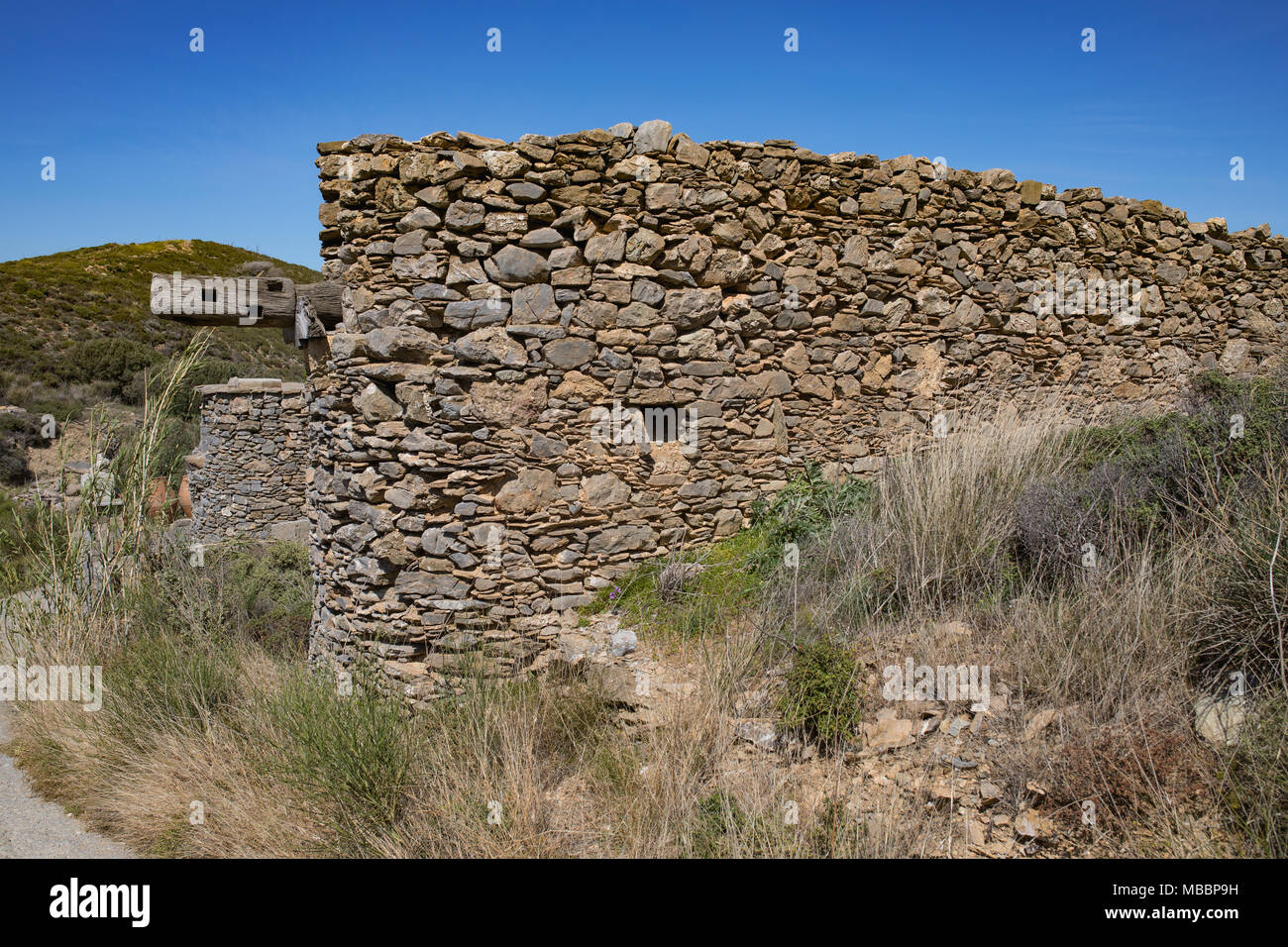 In traditional way rebuild house by archeological place, ruins in Chamezi. Remains after ancient minoan civilization. Aegean Bronze Age. Crete, Greece Stock Photo