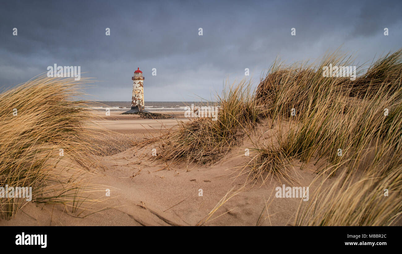 The Point of Ayr Lighthouse, also known as the Talacre Lighthouse, is a grade II listed building situated on the north coast of Wales Stock Photo