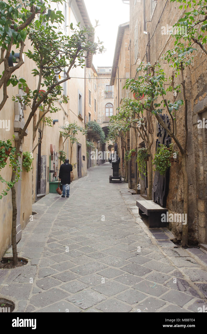 ORVIETO, ITALY - JANUARY 25, 2010: View of typical alleyway in the town of Orvieto in Umbria, Italy. Stock Photo
