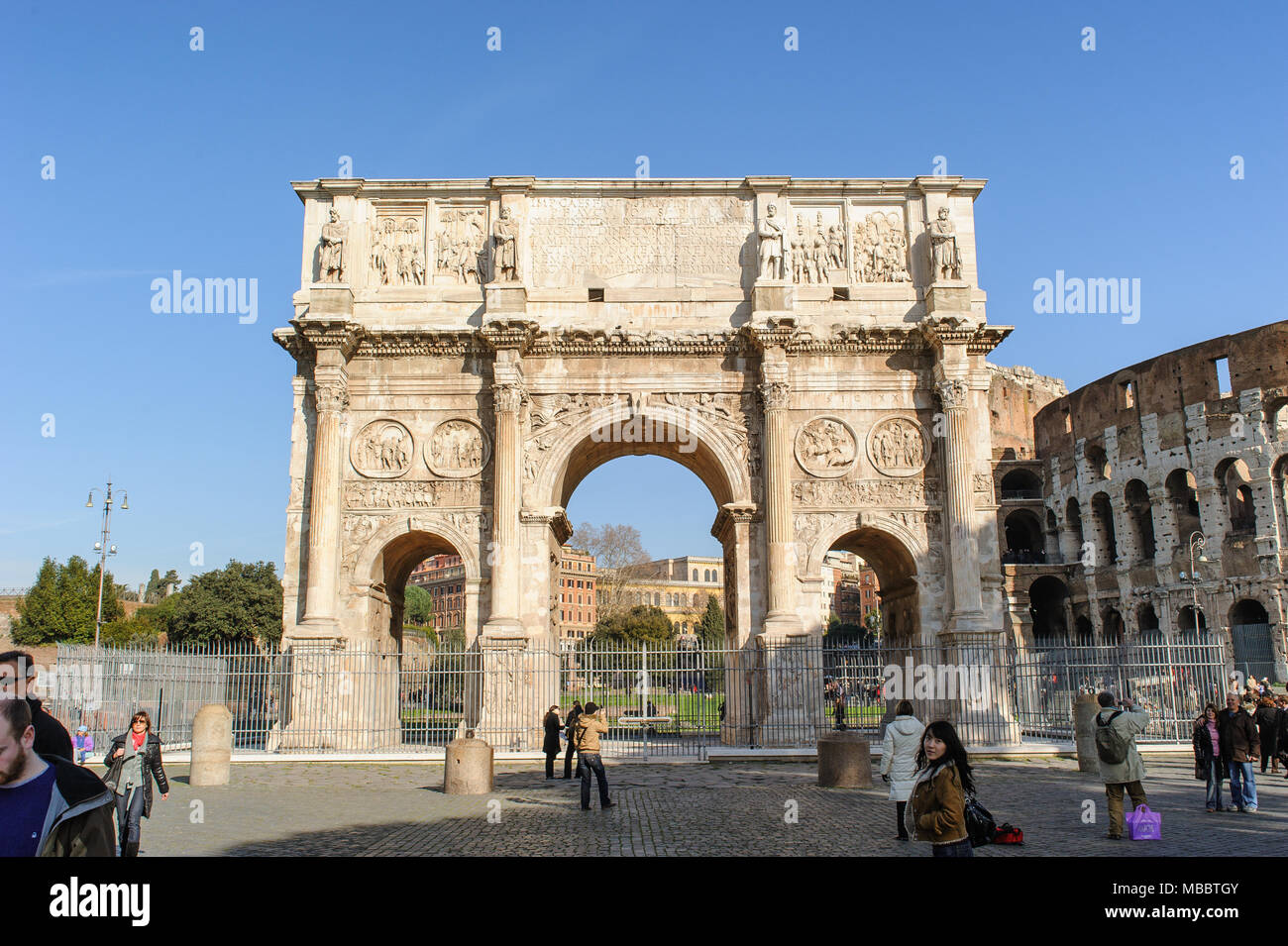 ROME, ITALY - JANUARY 21, 2010: Arch of Constantine is a triumphal arch in Rome near the colosseum and it is the lastest one of existing triumphal arc Stock Photo