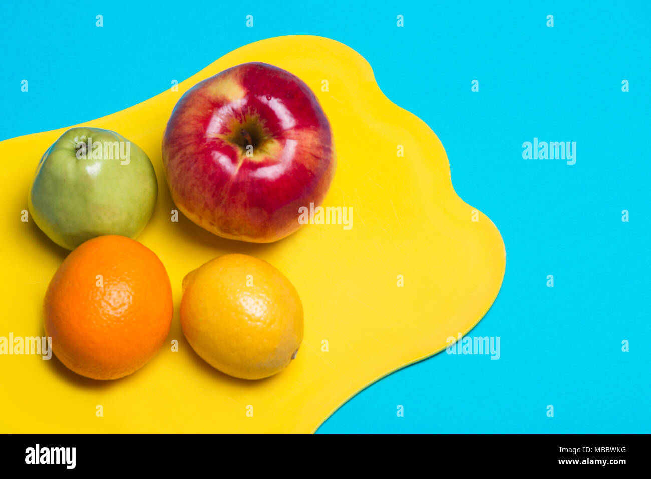 Fruit lying on a cutting board Stock Photo
