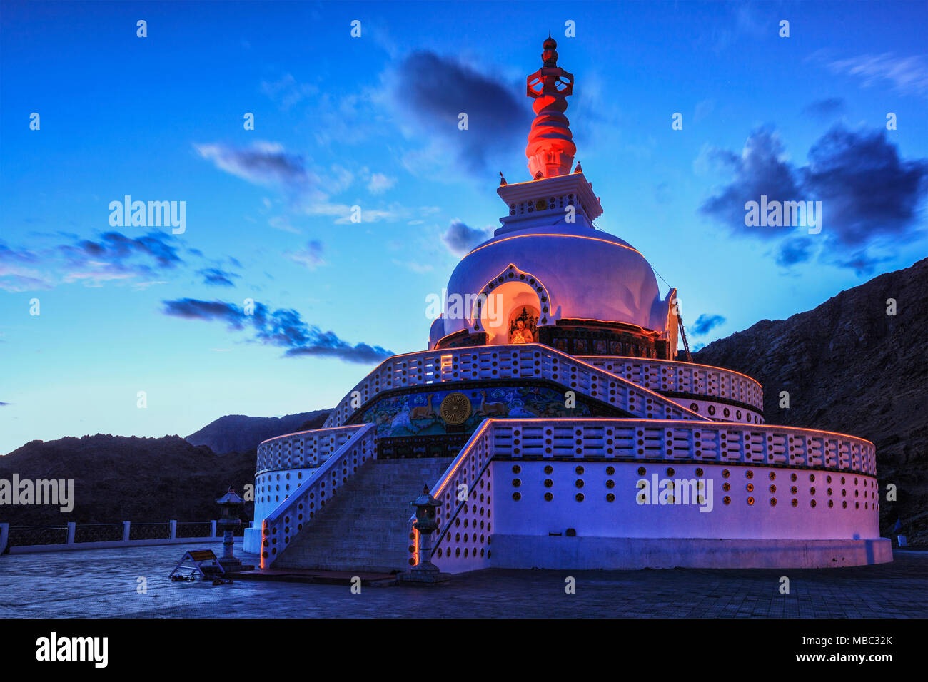 Shanti stupa illuminated in the evening twilight. Leh, Ladakh Stock Photo