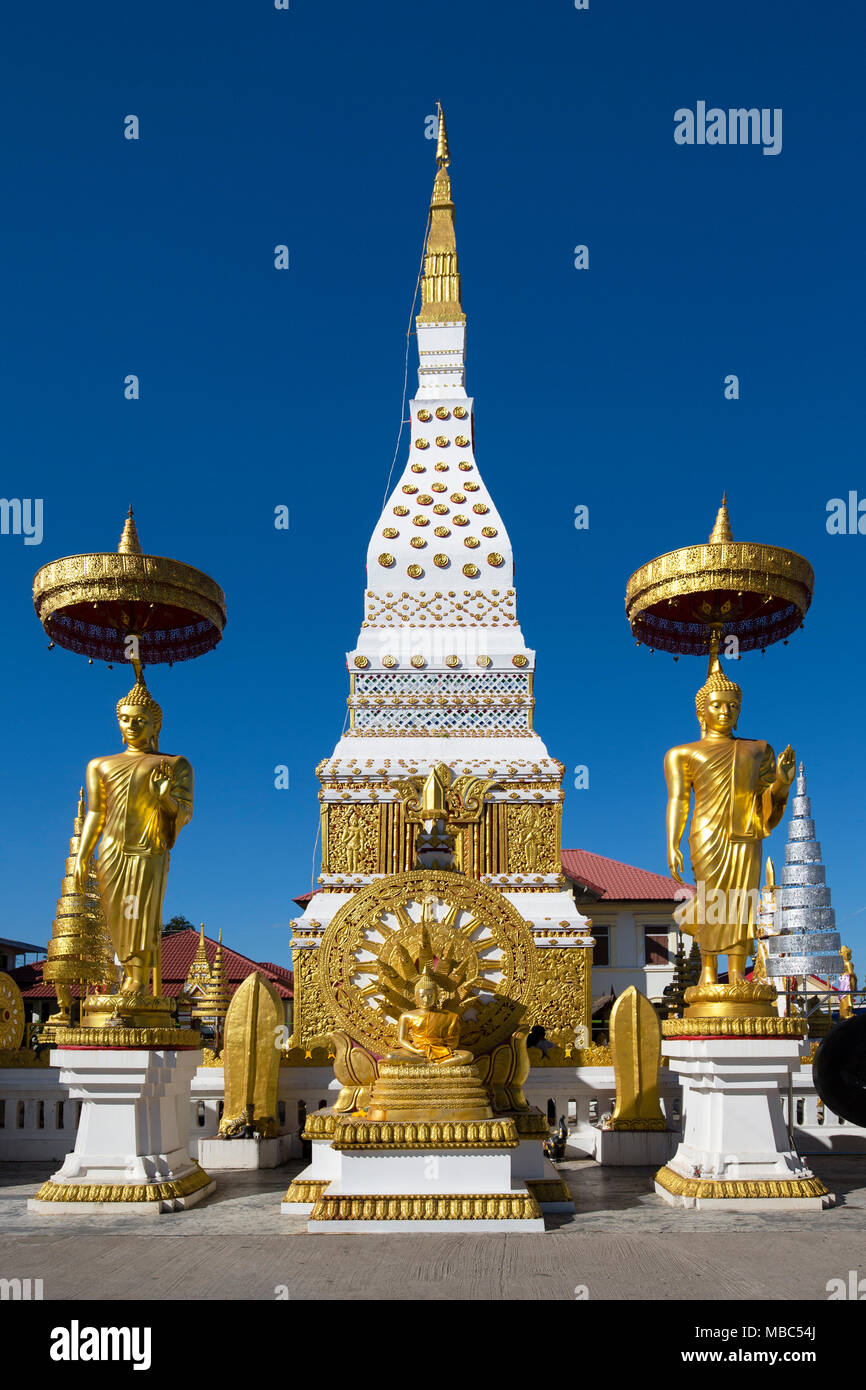 Chedi of Wat Mahathat Temple with Wheel of Life and golden Buddha figures, Nakhon Phanom, Isan, Thailand Stock Photo