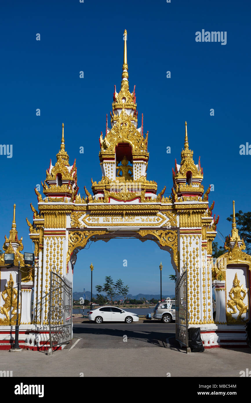 Gilded entrance gate to Wat Mahathat Temple, Nakhon Phanom, Isan, Thailand Stock Photo