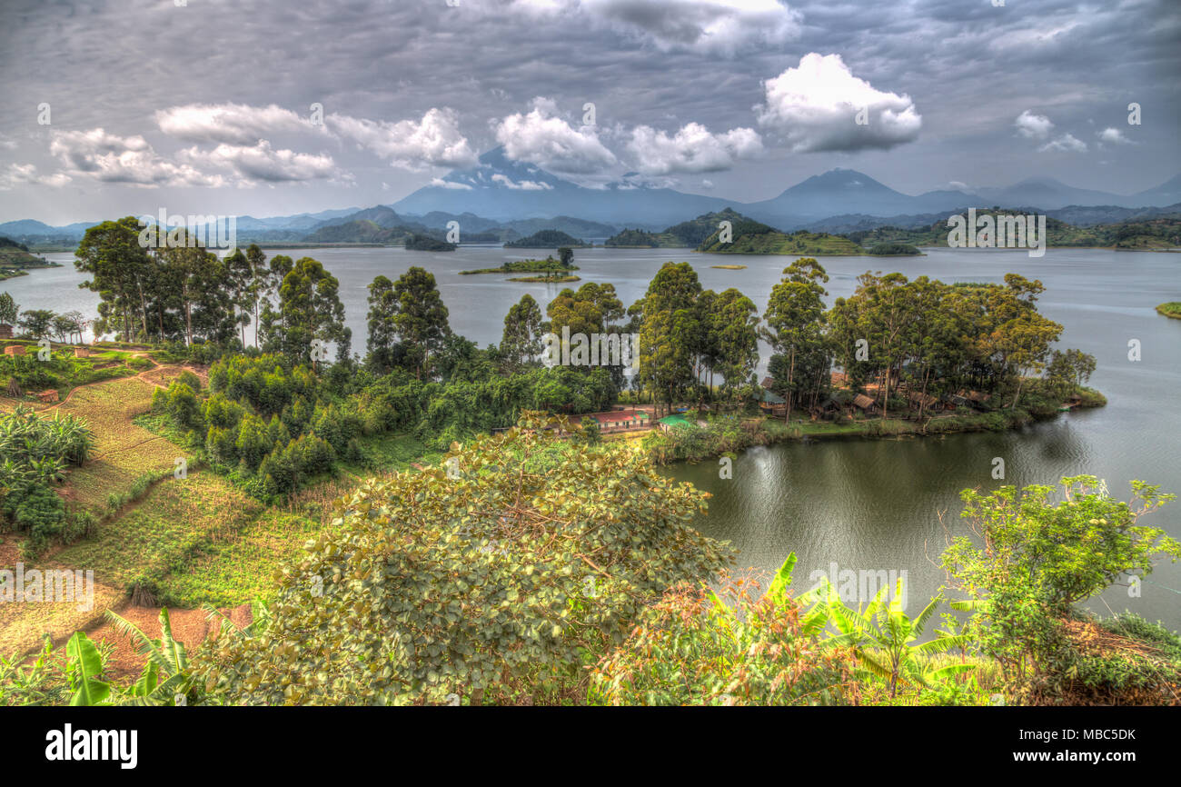 Lake Mutanda, east bank, behind Virunga Mountains, Uganda Stock Photo