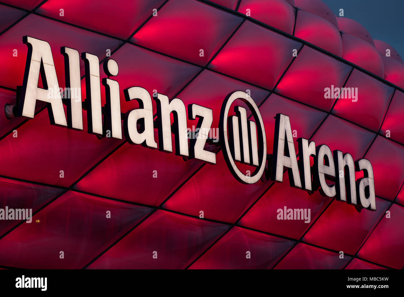 Red illuminated Allianz Arena with lettering, detail, Munich, Upper Bavaria, Bavaria, Germany Stock Photo