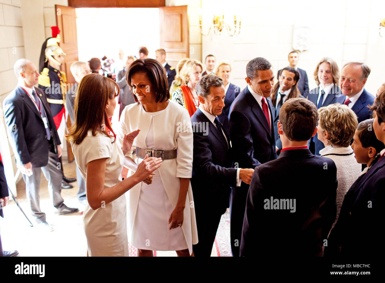 President Barack Obama And First Lady Michelle Obama Are Greeted By French President Nicolas Sarkozy And