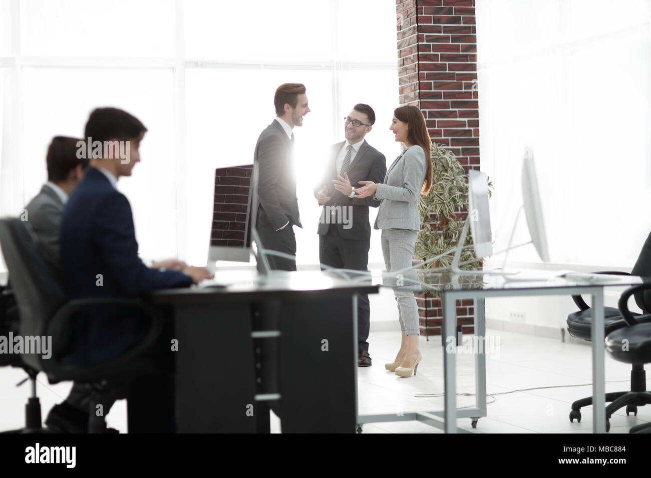 Young business crew working with startup modern office. Stock Photo