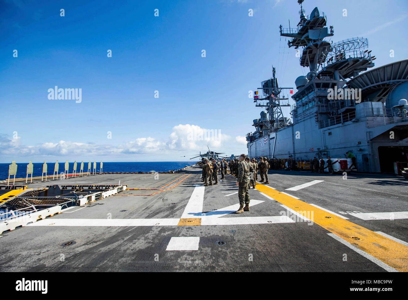 U.S. Marines with Battalion Landing Team, 2nd Battalion, 6th Marine Regiment (BLT 2/6), 26th Marine Expeditionary Unit (MEU), conduct short-range shooting drills aboard the USS Iwo Jima (LHD 7), Feb. 16, 2018. The 26th MEU is participating in a deployment at sea to conduct maritime and peacekeeping operations as well as maintain relations with foreign militaries through joint exercises. (U.S. Marine Corps Stock Photo