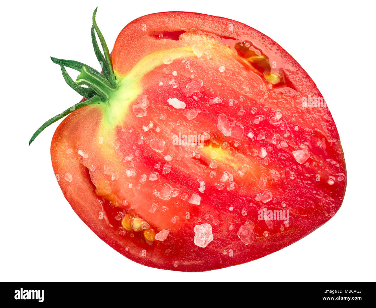 Slice or half of oxheart Cuor di bue tomato, salted, top view Stock Photo