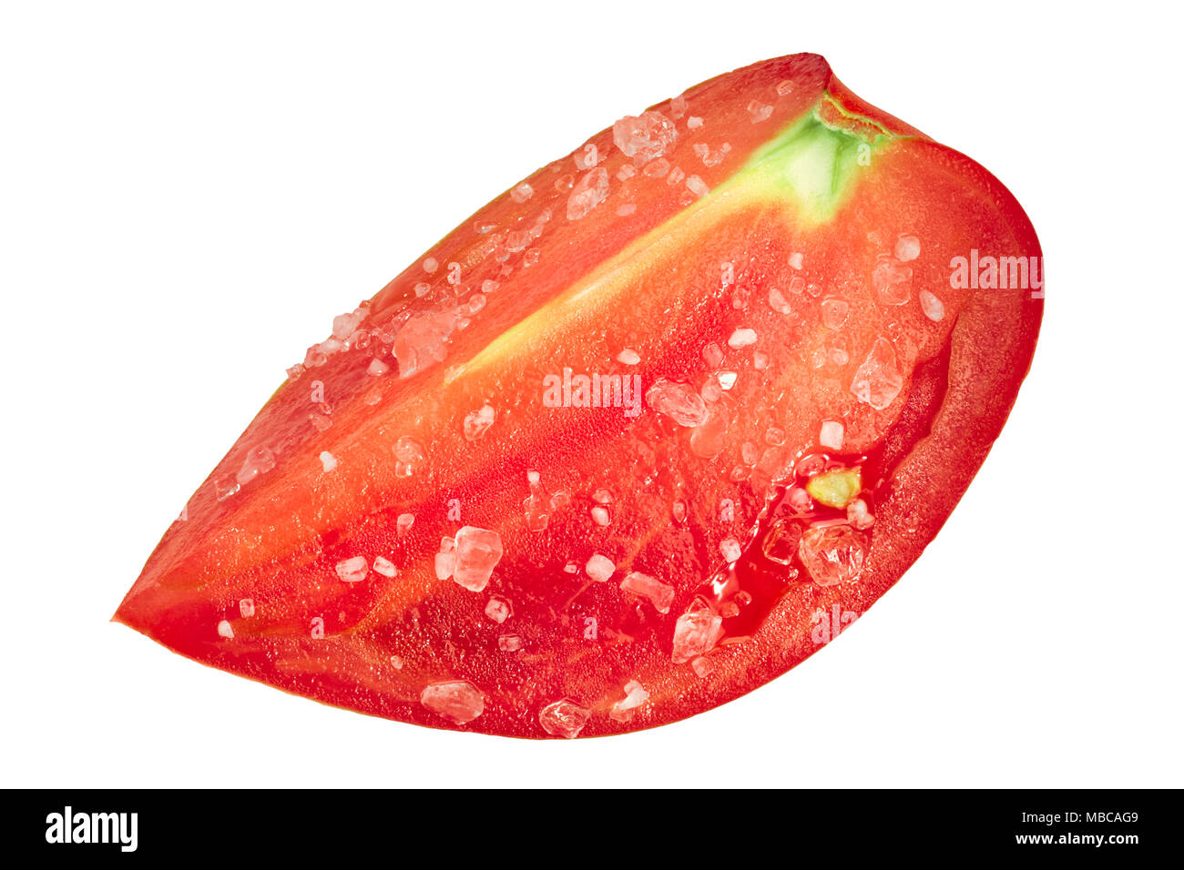 Slice or quarter of oxheart Cuor di bue tomato, salted, top view Stock Photo