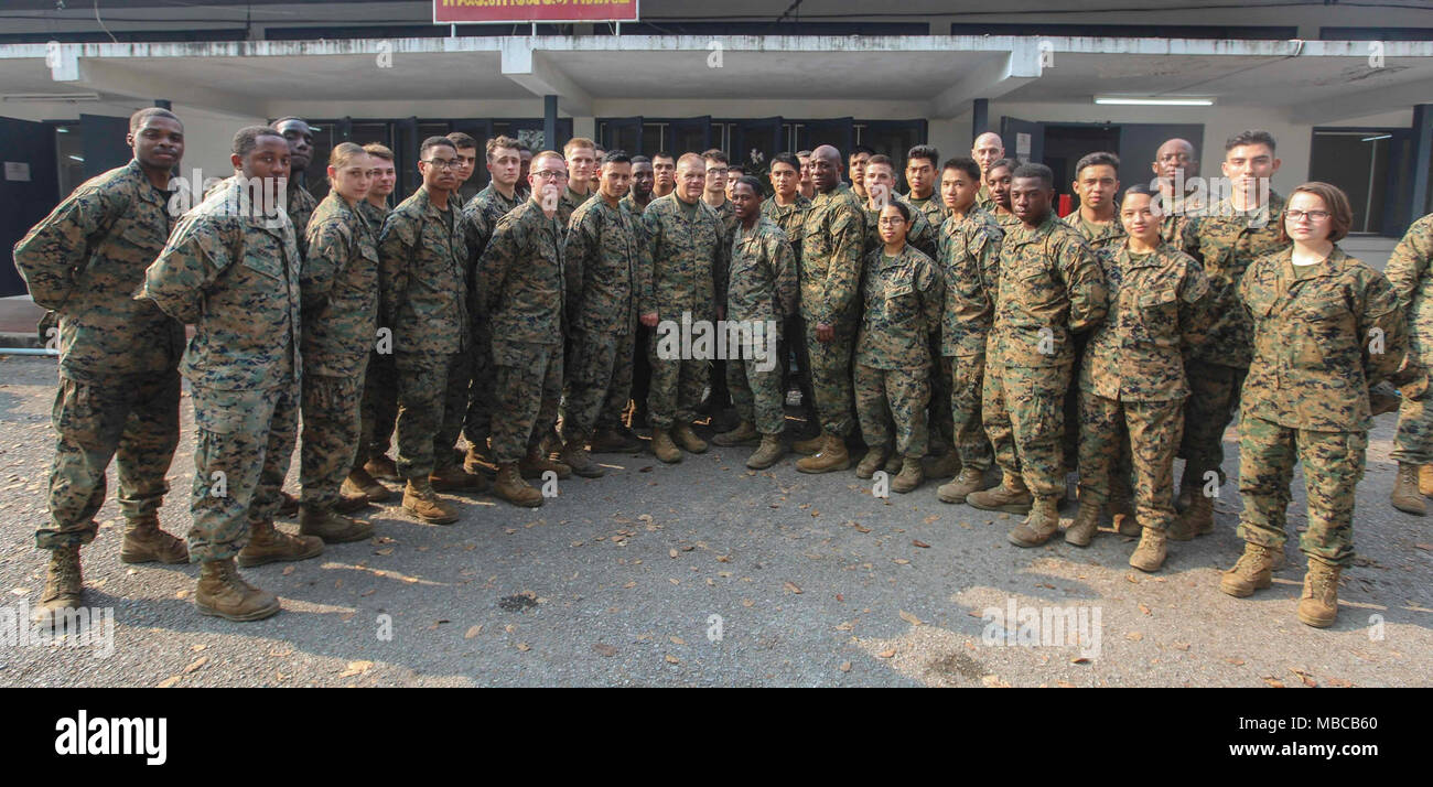 Commandant of the Marine Corps Gen. Robert B. Neller and Sergeant Major of the Marine Corps Sgt. Maj. Ronald L. Green pose for a photo with Marines during a visit to U-Tapao, Thailand, Feb. 18, 2018. Neller addressed the Marines about his latest Message to the Force: Execute and answered questions. (U.S. Marine Corps Stock Photo