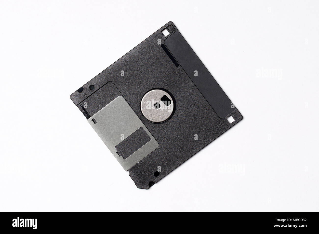 Black floppy disk on a white background Stock Photo - Alamy