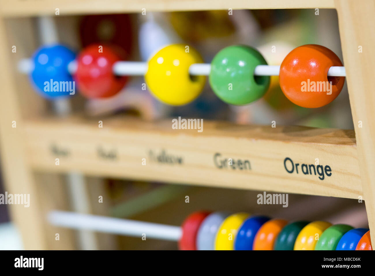 Wooden toys to learn and play with shapes and color (selective focus) Stock Photo
