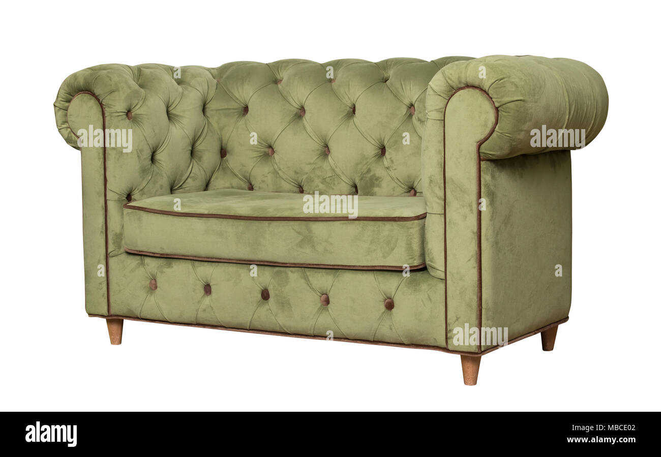 Green textile sofa isolated Stock Photo