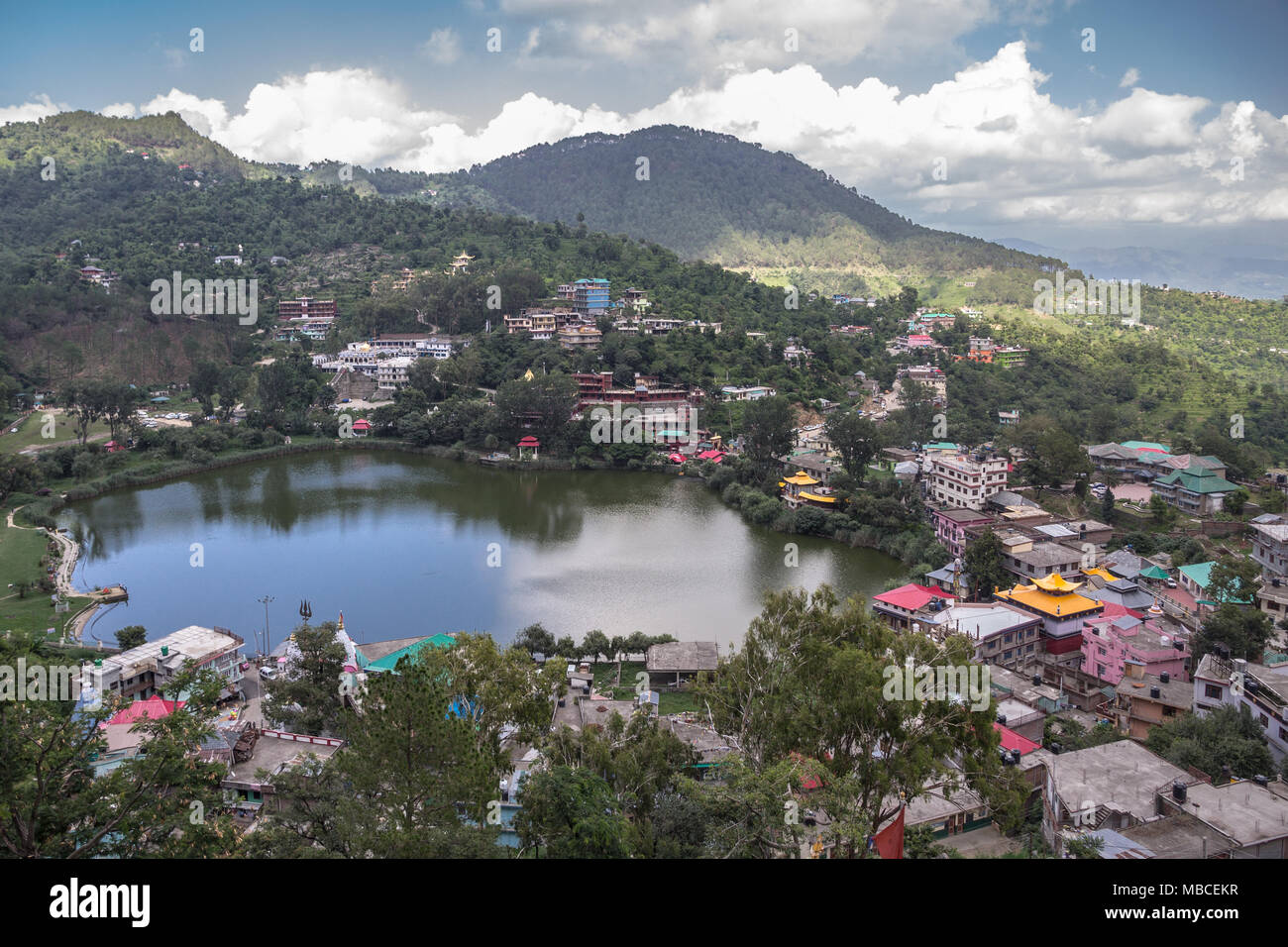 Small town of Rewalsar and the lake of same name has several holy sites including Buddhist monasteries seen from this vantage point up a hill Stock Photo