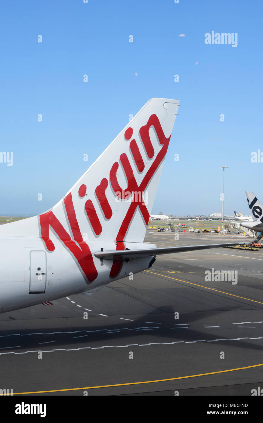 Tail of a Virgin Boeing 737-800 aircraft at Sydney airport, Australia Stock Photo