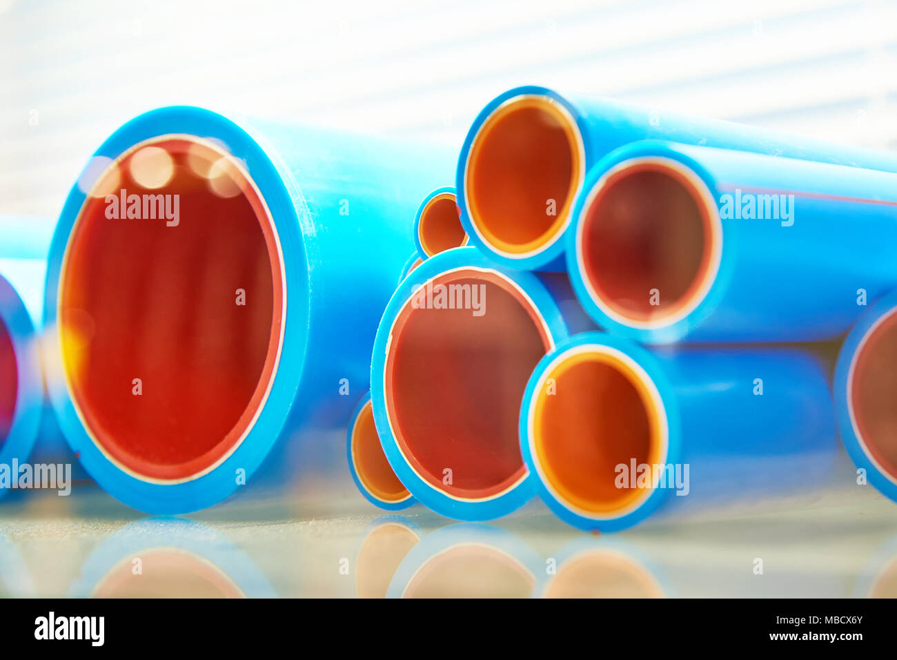 Color plastic pipes for industrial water supply and heating mains Stock