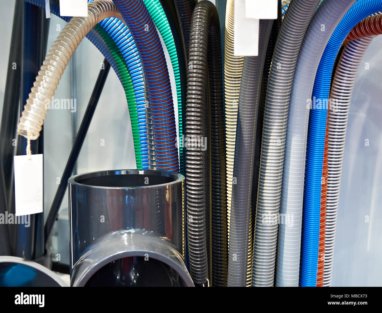 Corrugated plastic hoses for plumbing system Stock Photo