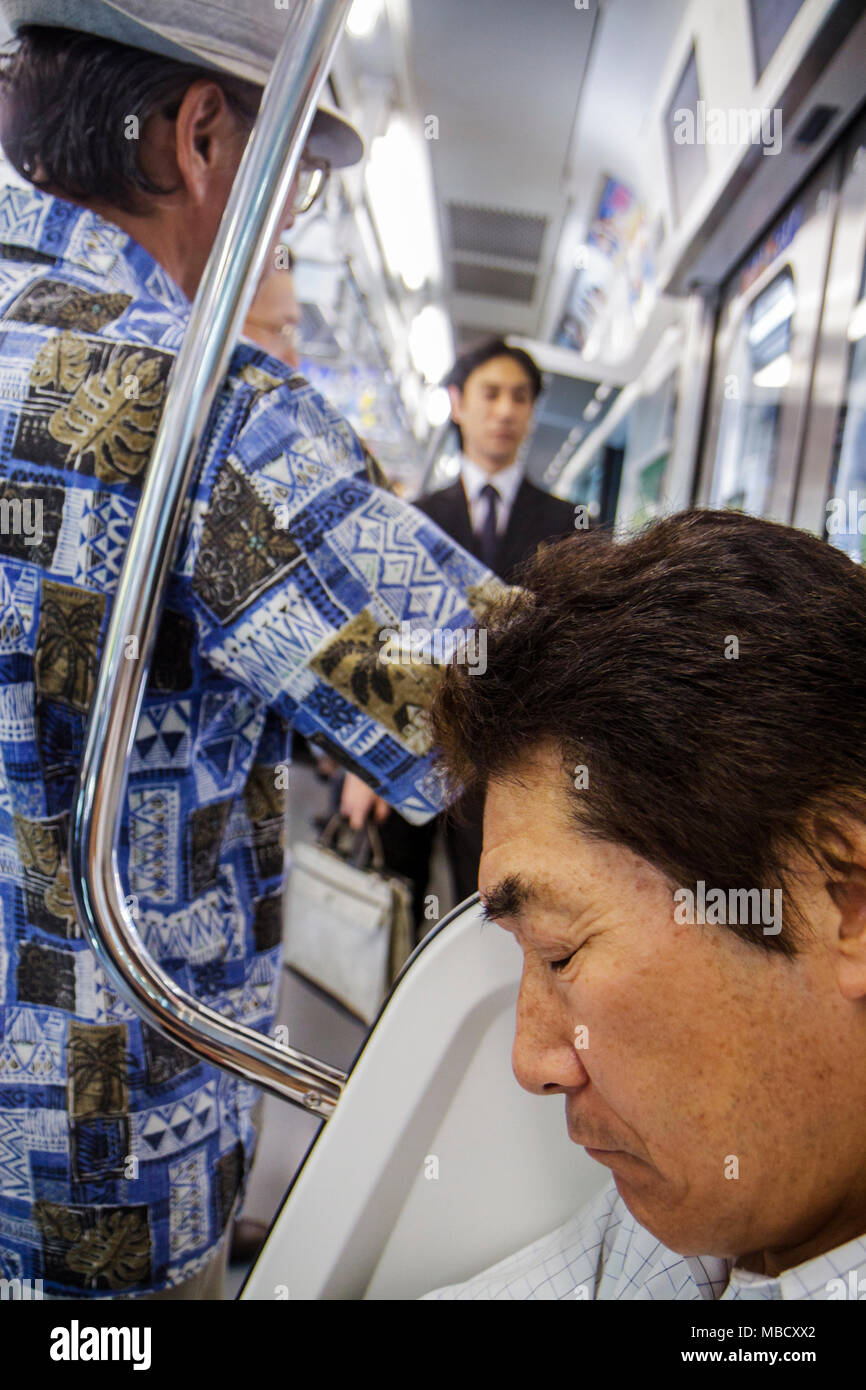Tokyo Japan,Asia,Orient,Shinjuku,JR Shinjuku Station,train,subway,train,train,Yamanote Line,Asian Asians ethnic immigrant immigrants minority,Oriental Stock Photo