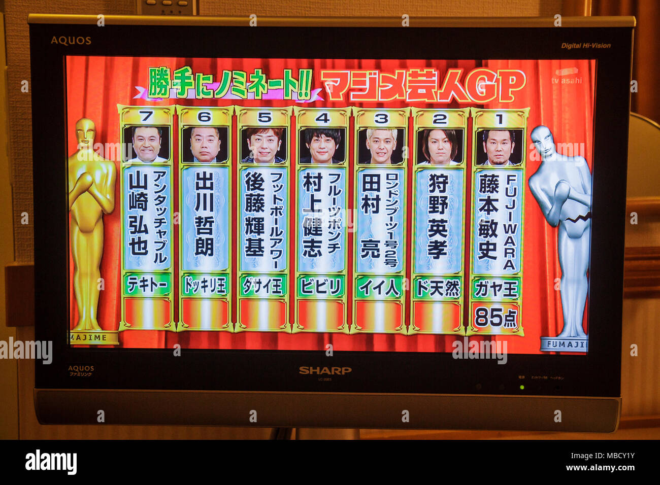 Tokyo Japan,Asia,Orient,Ikebukuro,Sharp Aquos widescreen LCD HDTV TV television,kanji,characters,symbols,comedy show,Asian Asians ethnic immigrant imm Stock Photo