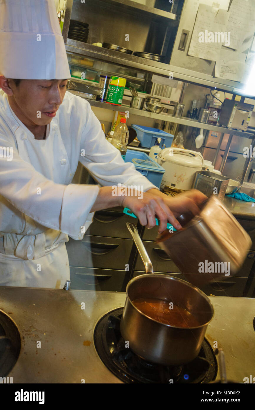 Tokyo Japan Akihabara Asian man restaurant kitchen cook worker cooking