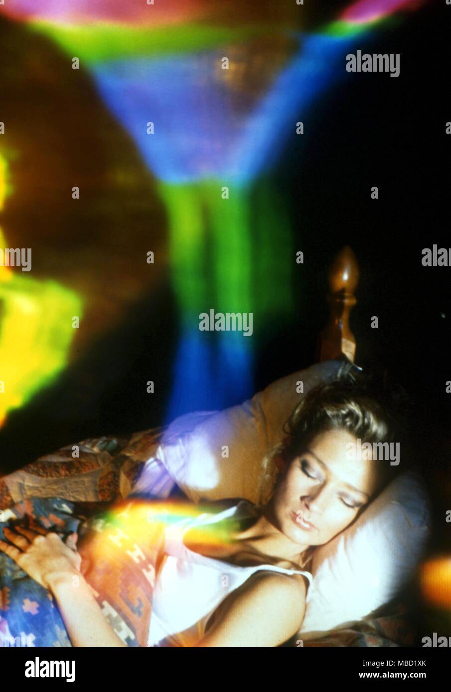 DREAMS AND DREAMING woman dreaming, with astral images Stock Photo