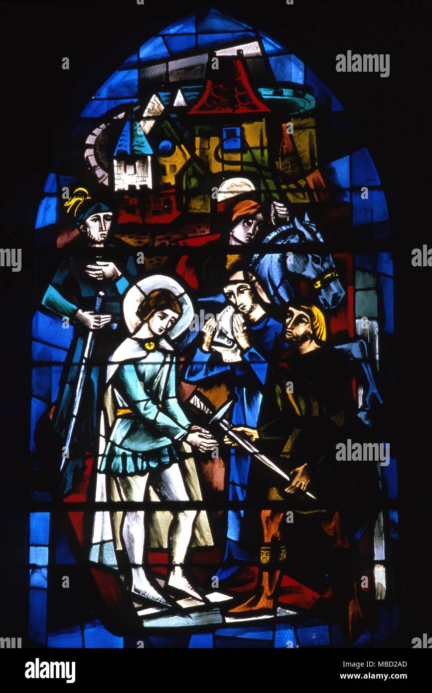 Details from the life of Joan of Arc. Joan being given sword and armour. Stained glass window in the Basilique du Bois- Chenu, at Domremy. 19th century. Stock Photo