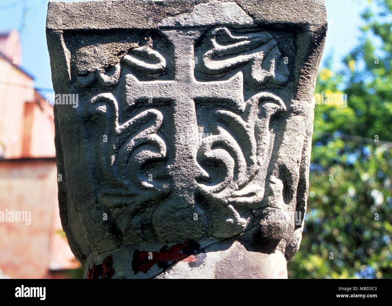 Symbols - Cross. The cross surrounded by floriations to symbolize the resurrection. Stock Photo