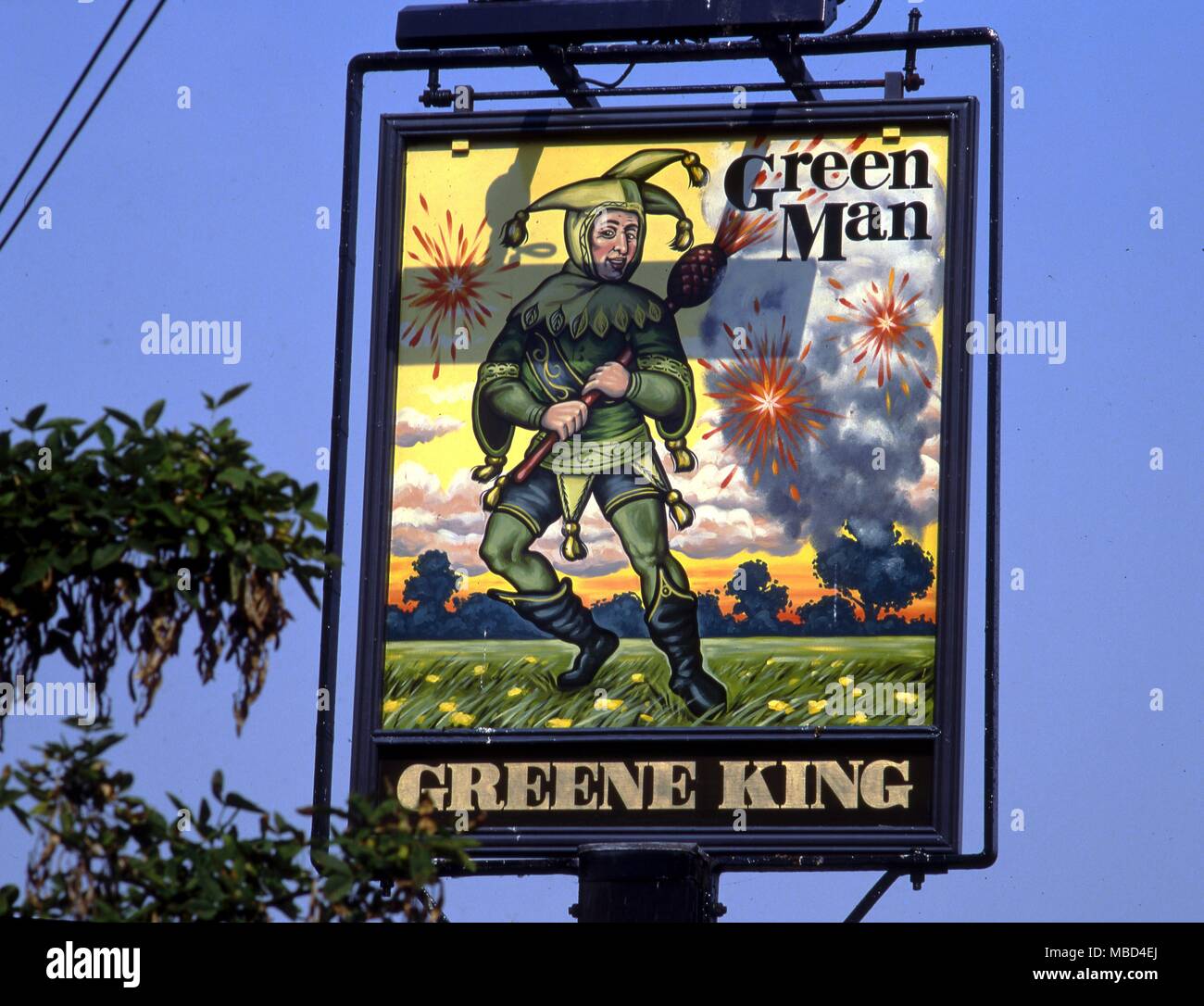 Inn sign of The Green Man in Lidlington, Bedfordshire. It reflects the connection between a clown and the Green Man Stock Photo