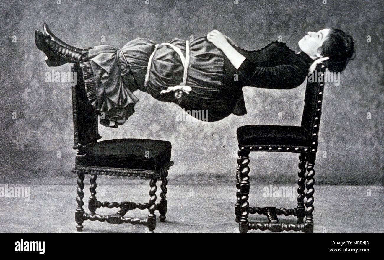 Hypnotism and mesmerism - Patient hypnotised using the Charcot method, and placed rigid between two chairs. From Lettres et les Arts, 1886. - © /CW Stock Photo