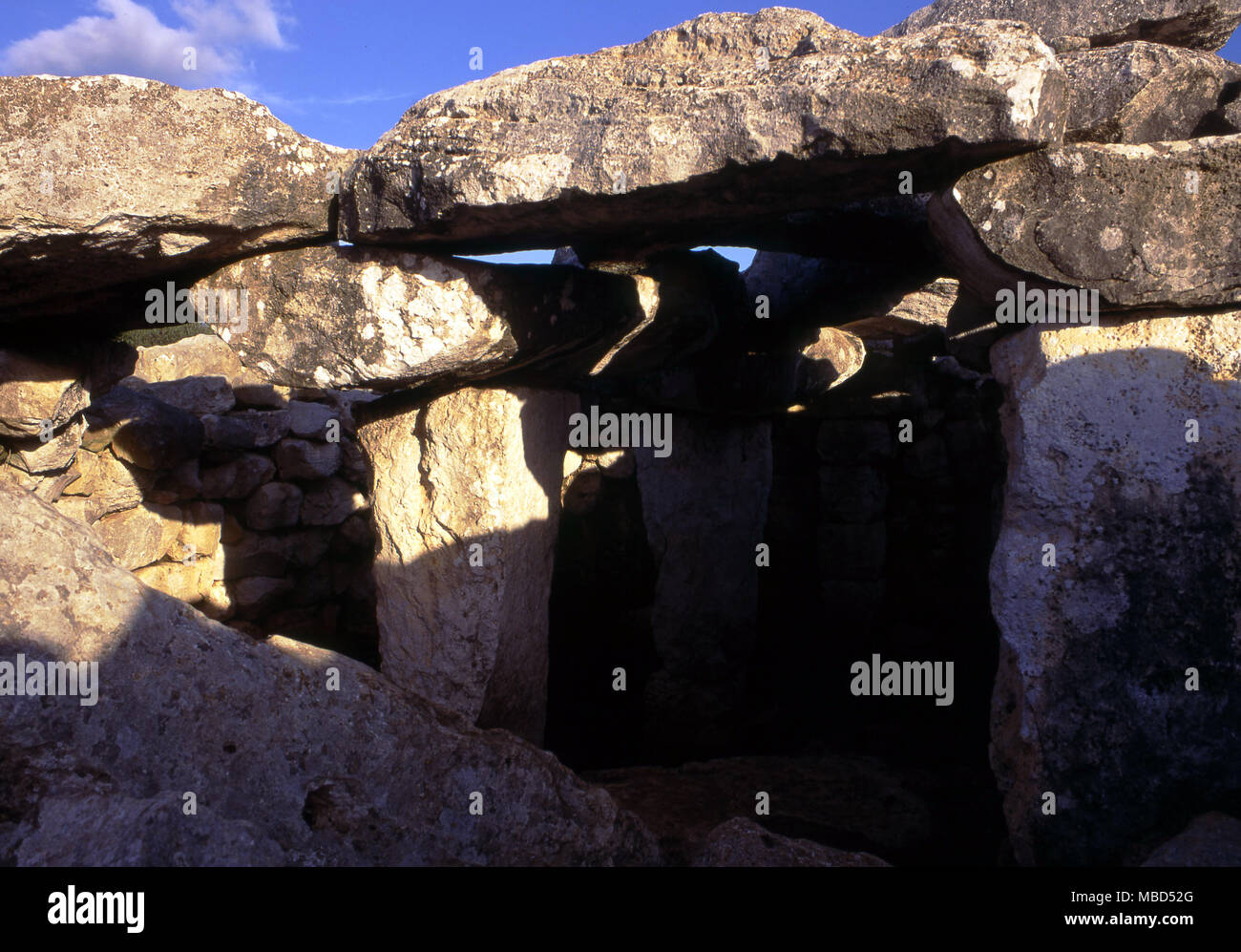 Menorca Archaeology. The underground monolithic chamber or hypogeum at Torre d'en Gaumes. Stock Photo