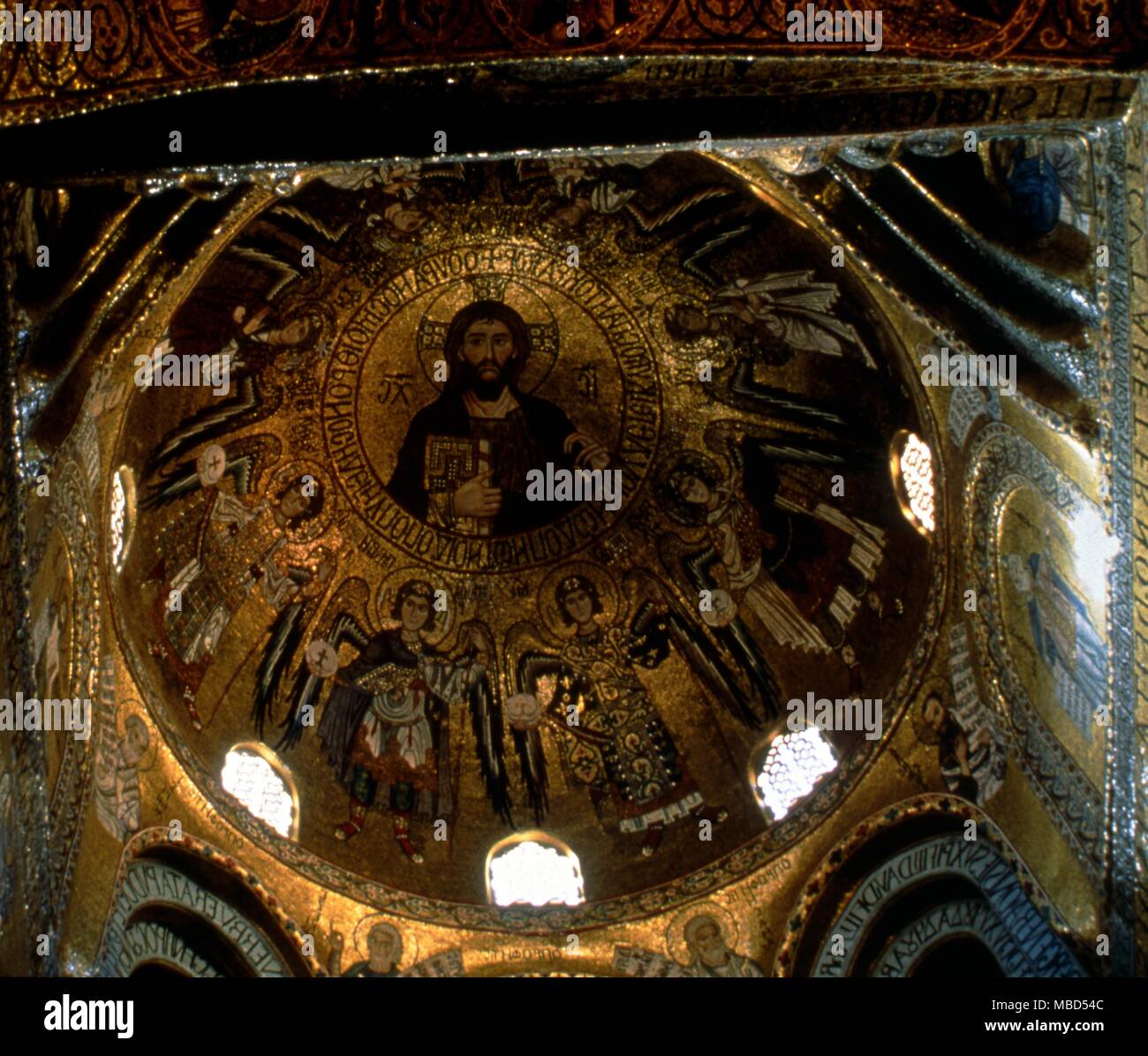 Mosaic of Christ giving his blessing, surrounded by archangels. In the high dome of the Palatine chapel, Palermo. Stock Photo