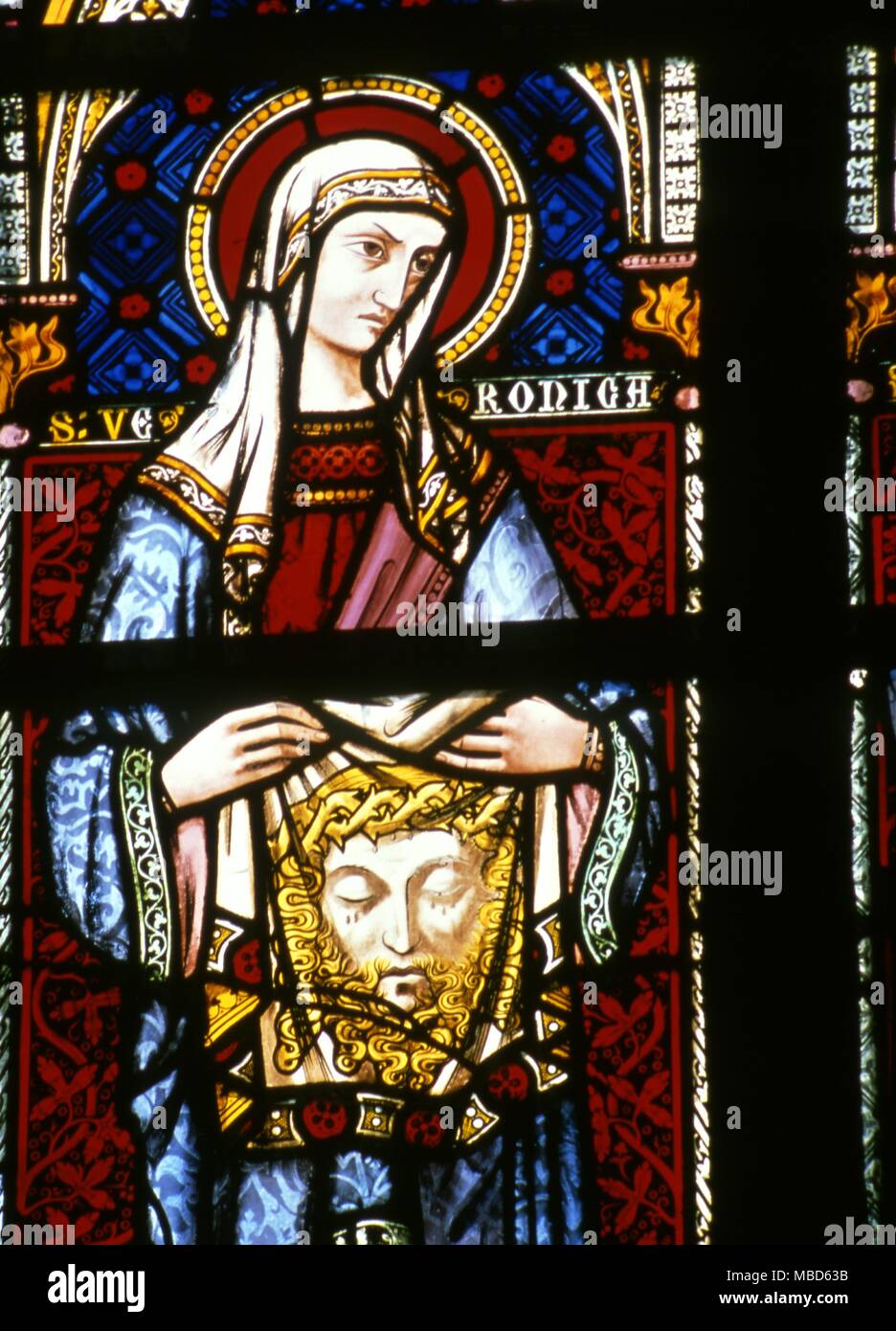 Christian St Veronica with the image of the face of Christ. Nineteenth century stained glasses Stock Photo