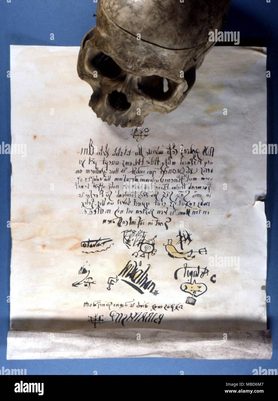 MAGICAL ALPHABETS - A pact document, said to have been signed (in reverse Latin) by various demons, to record a pact between them and the 17th century priest, Urbain Grandier. Note the demonic sigils. Stock Photo